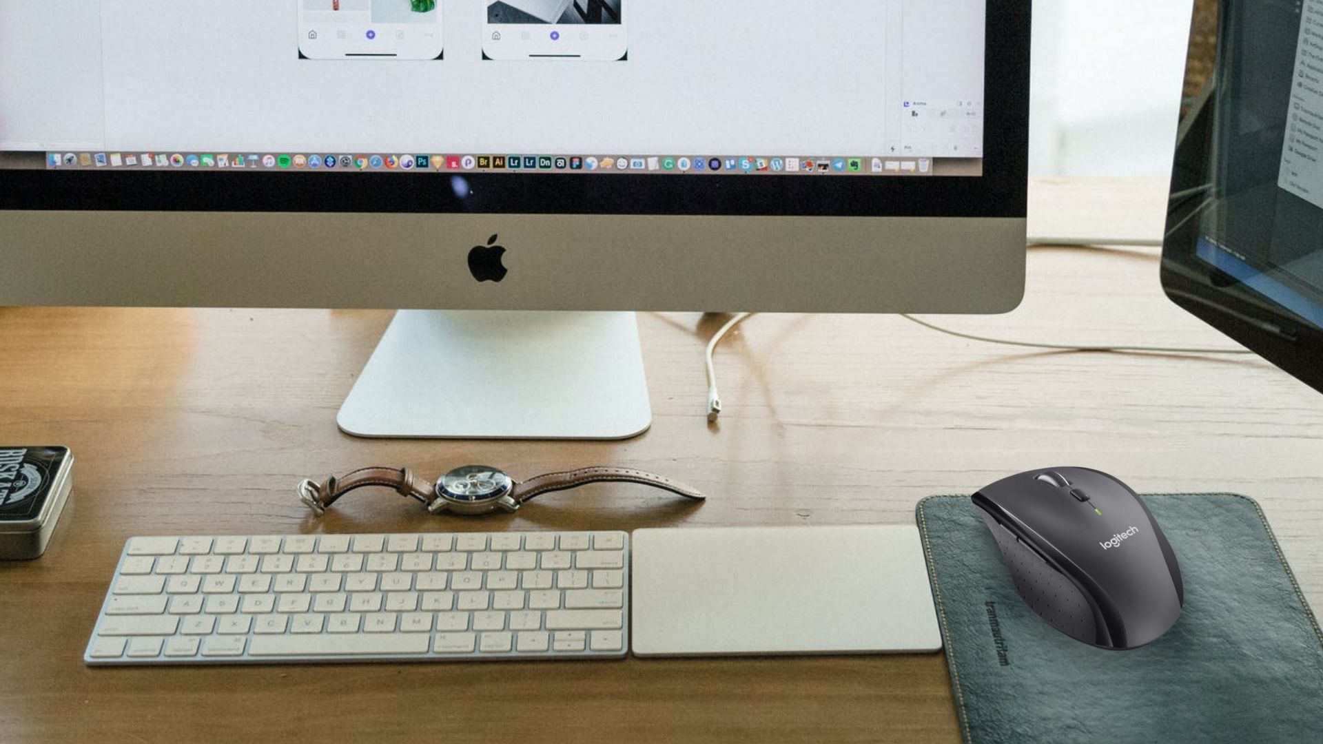 show logitech mouse connected wirelessly with a MacBook laptop